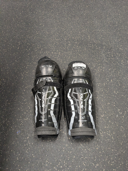 Vist Large View of Product Image Which is Used CCM TACKS ULTRA 2.0 SG Junior Shin Guards Black 10"
