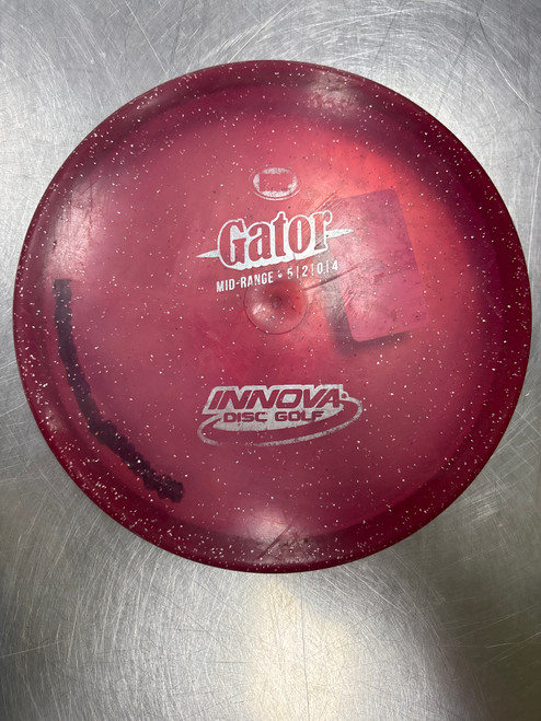 Vist Large View of Product Image Which is Used Innova METAL FLAKE GATOR Disc Golf Mid Range Maroon
