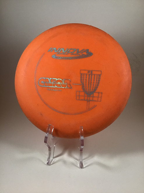 Vist Large View of Product Image Which is Used Innova DX AVIAR Disc Golf Putter Orange 168g