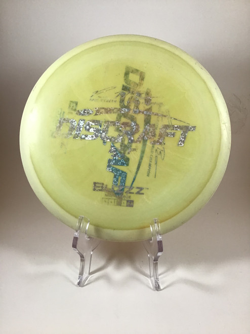 Vist Large View of Product Image Which is Used Discraft ESP BUZZZ Disc Golf Mid Range Yellow 174g
