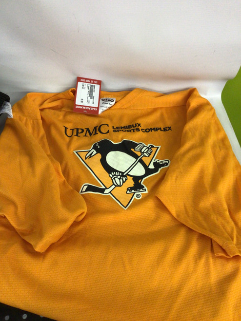 Vist Large View of Product Image Which is Used A Gamers Hockey Practice Jersey Gold LG