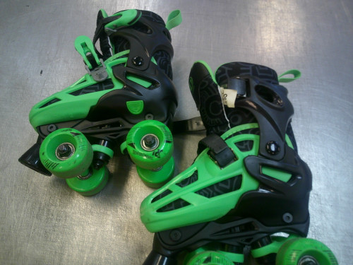 Vist Large View of Product Image Which is Used RollerDerby ADJ 12-2 Child Roller Quad Skates Black Youth 12.0