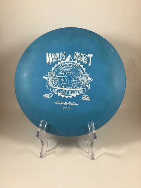 Vist Large View of Product Image Which is Used Innova DX COBRA Disc Golf Mid Range Royal Blue