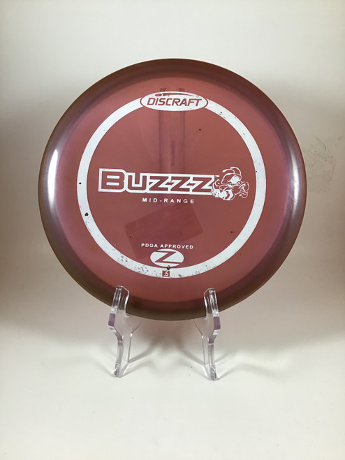 Vist Large View of Product Image Which is Used Discraft Z BUZZZ Disc Golf Mid Range Maroon 175g