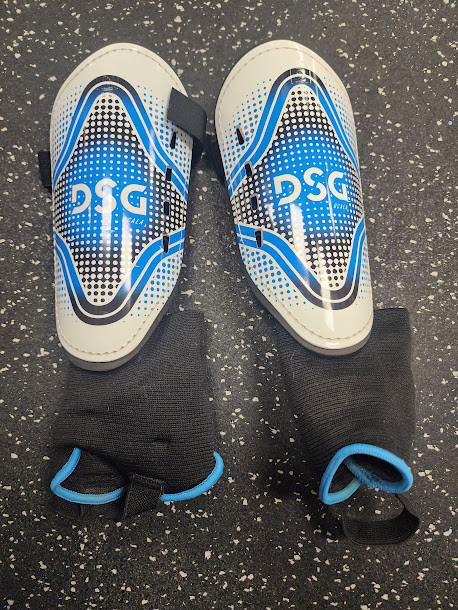 Vist Large View of Product Image Which is Used DSG Soccer Shin Guards Junior White XL