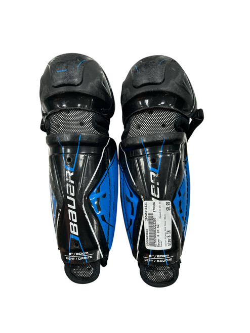 Vist Large View of Product Image Which is Used Bauer 8 IN SG Youth Shin Guards Black And Navy Blue 8"