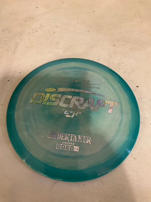 Vist Large View of Product Image Which is Used Discraft UNDERTAKER Disc Golf Driver Green