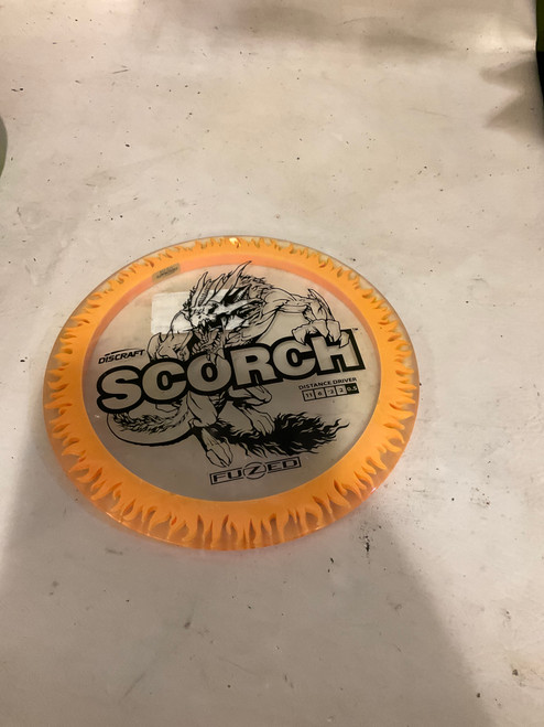 Vist Large View of Product Image Which is Used Discraft SCORCH Disc Golf Driver Orange