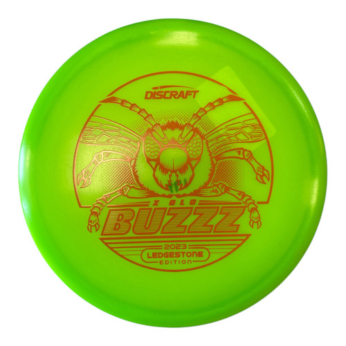 Vist Large View of Product Image Which is New Discraft Z GLO BUZZZ Disc Golf Mid Range Green 177g