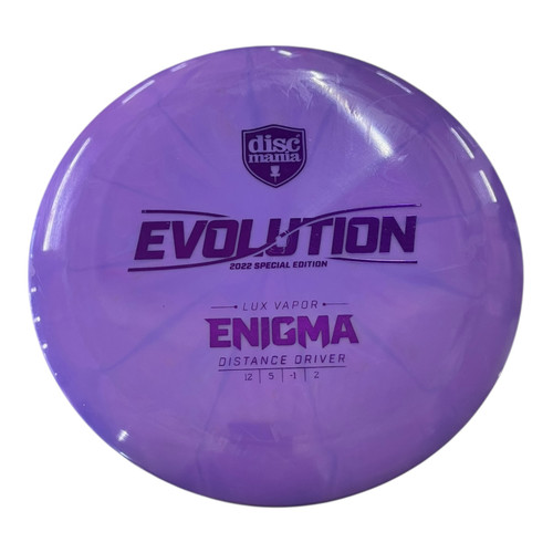 Vist Large View of Product Image Which is Used Discmania EVOLUTION LUX VAPOR ENIGMA Disc Golf Driver Purple 175g