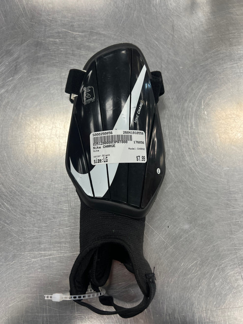Vist Large View of Product Image Which is Used Nike CHARGE Soccer Shin Guards Adult Black LG
