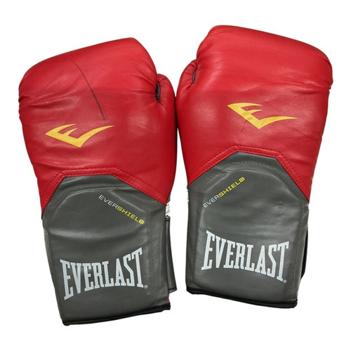 Vist Large View of Product Image Which is Used Everlast EVERSHIELD 12OZ Heavy Bag Gloves Red MD