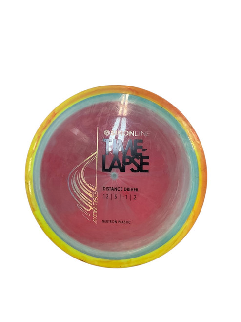 Vist Large View of Product Image Which is Used Axiom TIME LAPSE Disc Golf Driver Pink