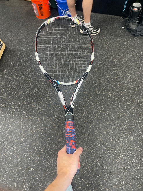 Vist Large View of Product Image Which is Used Babolat PURE DRIVE F0 Adult Tennis Racquet Black 4 3/8"