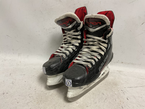Vist Large View of Product Image Which is Used Bauer VAPOR X4 Junior Hockey Skate White/Black/Red Junior 02