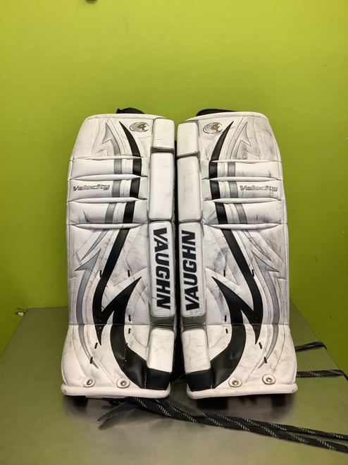 Vist Large View of Product Image Which is Used Vaughn VELOCITY V4 7150 Goalie Leg Pads Junior White MD
