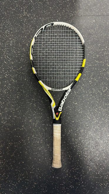Vist Large View of Product Image Which is Used Babolat AERO PRO DRIVE Adult Tennis Racquet Yellow 4 1/4"