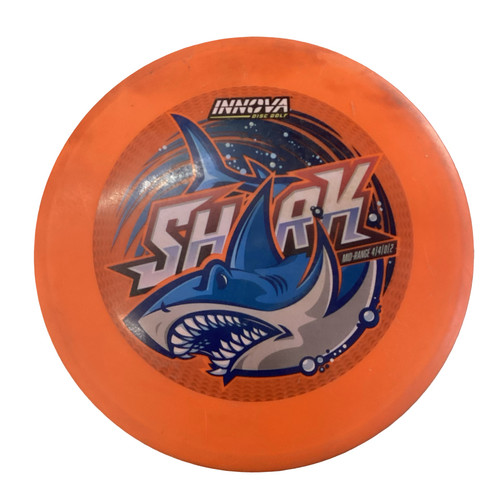 Vist Large View of Product Image Which is Used Innova SHARK Disc Golf Mid Range Orange