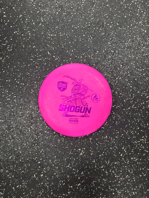 Vist Large View of Product Image Which is Used Discmania SHOGUN ACTIVE Disc Golf Putter Pink