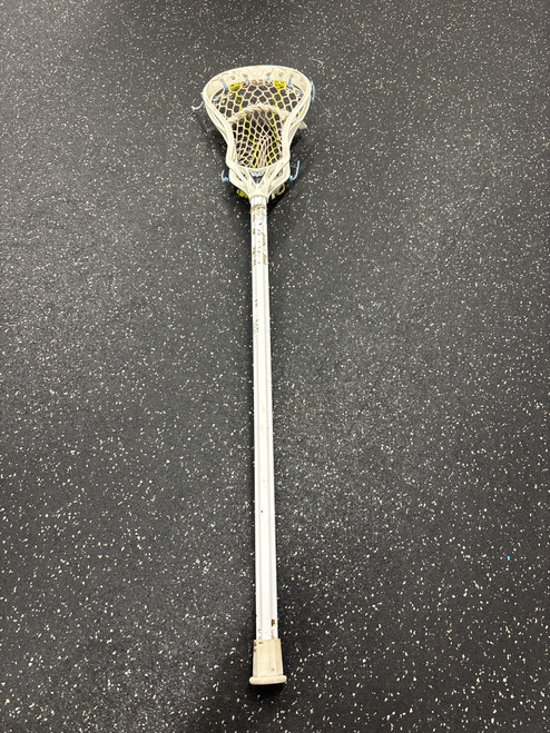 Vist Large View of Product Image Which is Used Warrior EVO 5 W/ ECD CARBON 2.0 JR STICK Jr Atk/Mid Complete Stick White 37"