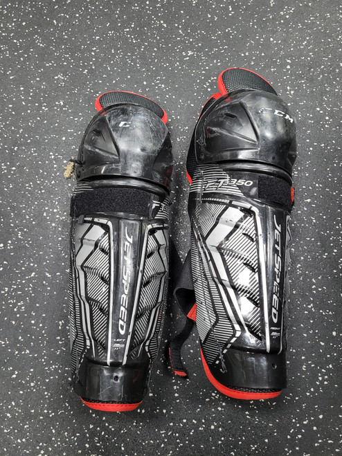 Vist Large View of Product Image Which is Used CCM JETSPEED Junior Shin Guards Black 11"