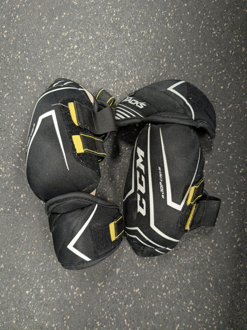 Vist Large View of Product Image Which is Used CCM TACKS ULTRA 2.0 EP Junior Elbow Pads LG