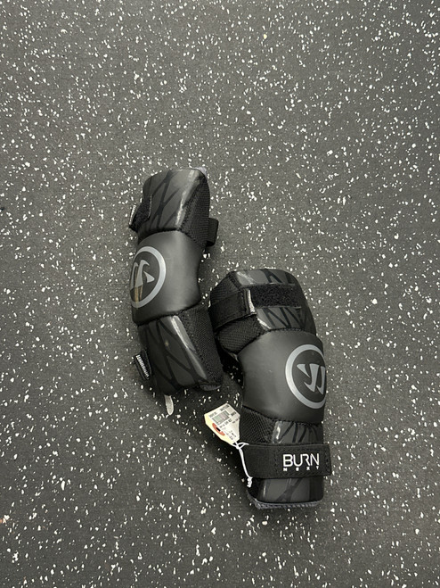 Vist Large View of Product Image Which is Used Warrior BURN NEXT Lacrosse Arm Pads/Guards Black MD