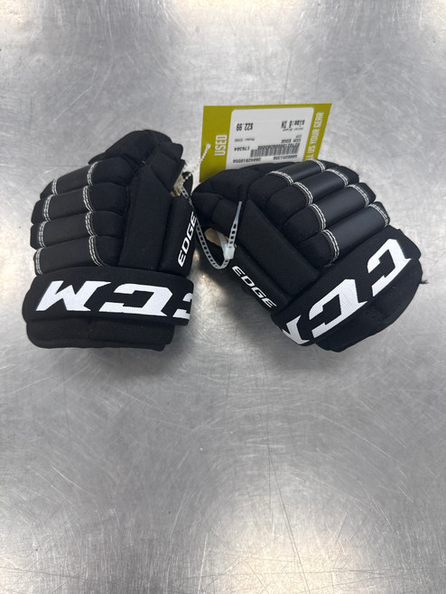 Vist Large View of Product Image Which is Used CCM EDGE Youth Gloves Black 8"