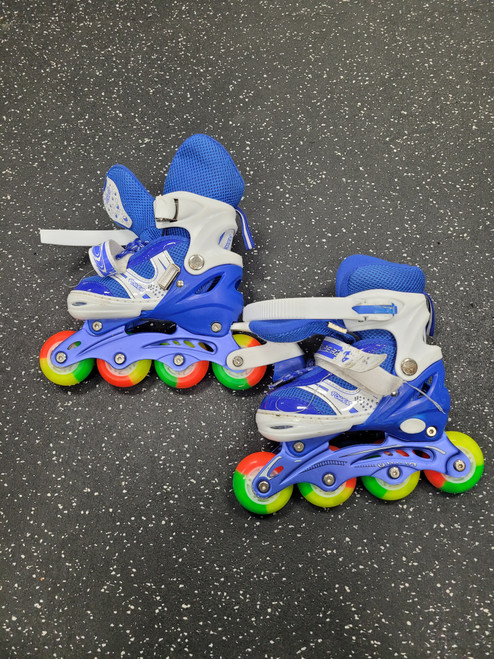 Vist Large View of Product Image Which is Used POWER SUPERB Junior Roller Quad Skates Royal Blue Adjustable
