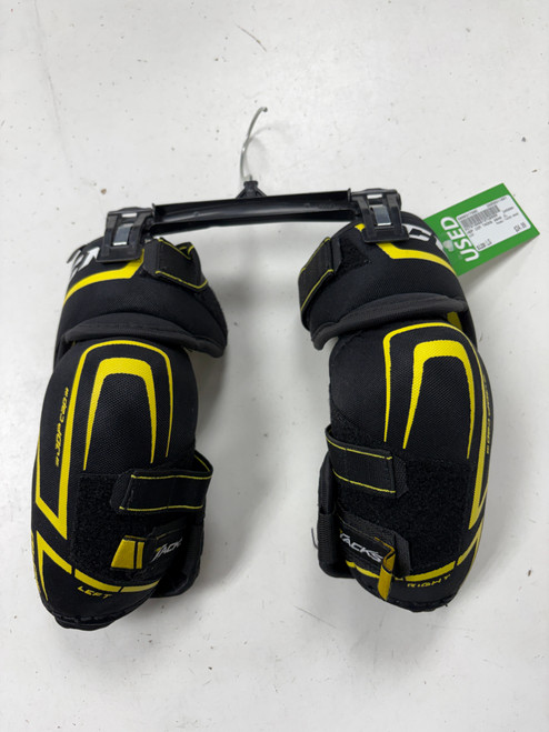 Vist Large View of Product Image Which is Used CCM TACKS 9040 Junior Elbow Pads LG