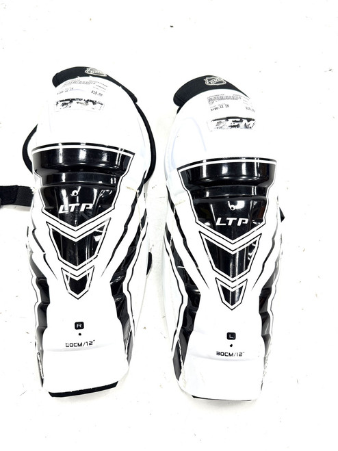Vist Large View of Product Image Which is Used CCM LTP Junior Shin Guards White 12"