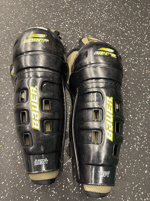 Vist Large View of Product Image Which is Used Bauer IMPACT FORCE Junior Shin Guards Black 12"