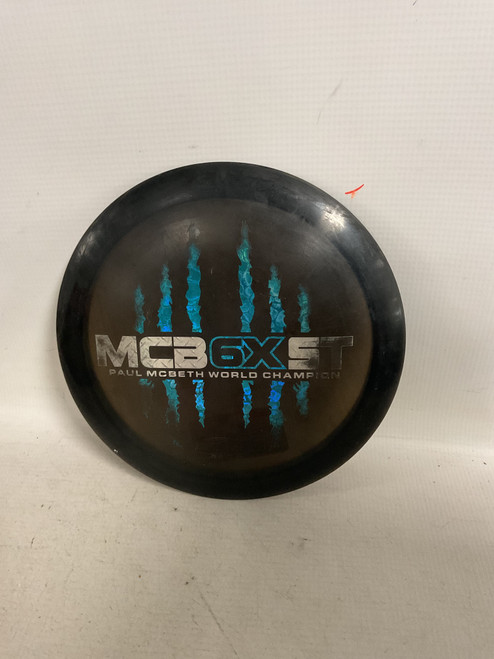 Vist Large View of Product Image Which is Used Discraft MCB6SXT HEAT Disc Golf Driver Black