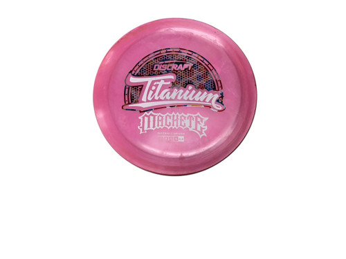 Vist Large View of Product Image Which is USED DISCRAFT TITANIUM MACHETE DISC GOLF DRIVER PINK