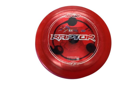 Vist Large View of Product Image Which is USED DISCRAFT RAPTOR DISC GOLF DRIVER RED