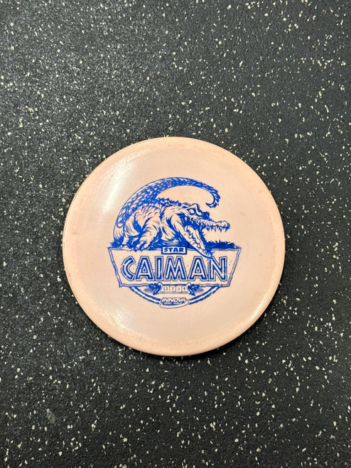 Vist Large View of Product Image Which is Used Innova CAIMAN Disc Golf Mid Range Pink 175g