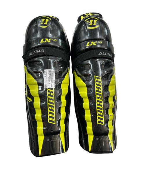 Vist Large View of Product Image Which is Used Warrior ALPHA LX40 SR 16 SHIN Senior Shin Guards Black And Optic Yellow 16"