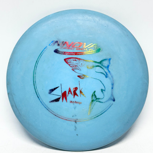 Vist Large View of Product Image Which is Used Innova DX SHARK Disc Golf Mid Range Carolina Blue 180g