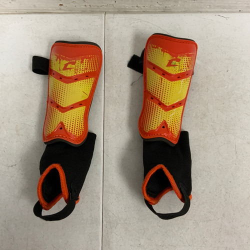 Vist Large View of Product Image Which is Used Champro Soccer Shin Guards Junior Orange Junior