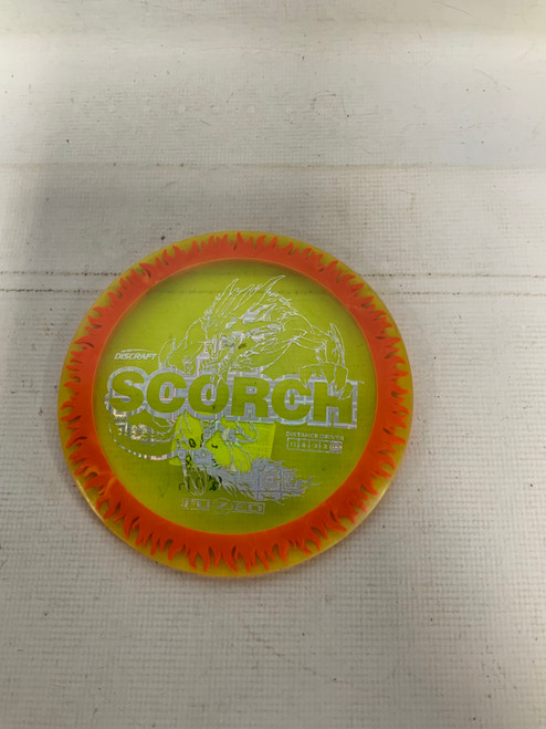 Vist Large View of Product Image Which is Used Discraft SCORCH FUZED Disc Golf Driver Yellow