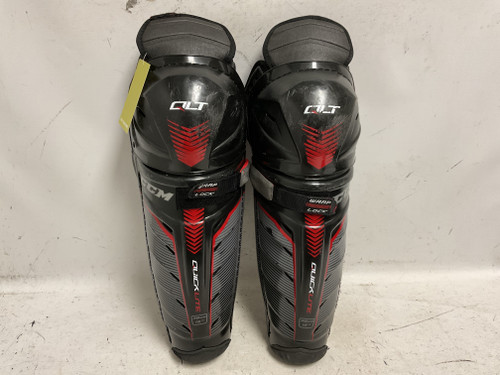 Vist Large View of Product Image Which is Used CCM QLT Senior Shin Guards Black And Red 15"