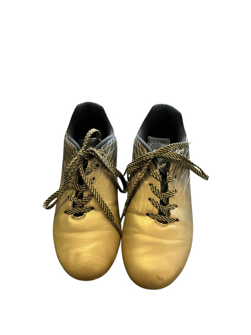 Vist Large View of Product Image Which is Used Dsg Soccer Cleats Gold Junior 01
