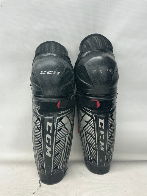 Vist Large View of Product Image Which is Used CCM LE Junior Shin Guards Black 12"
