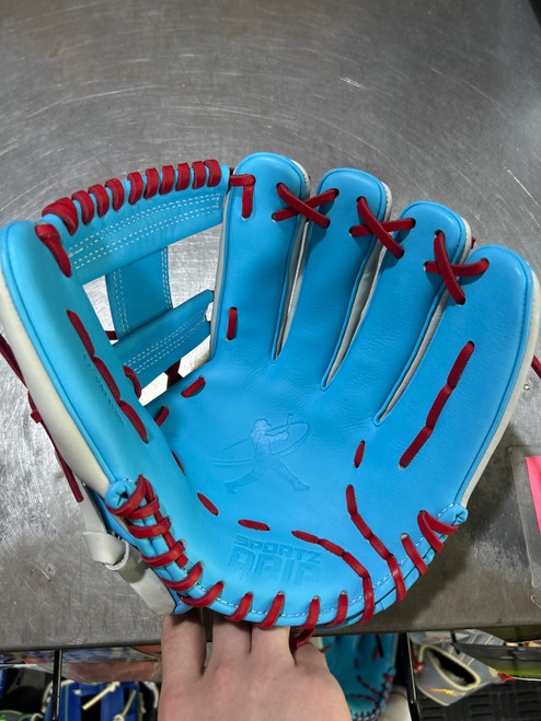 Vist Large View of Product Image Which is Used SPORTZ DRIP BB/SB Glove RH Throw Carolina Blue And White 12"