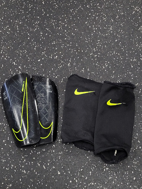 Vist Large View of Product Image Which is Used Nike Soccer Shin Guards Youth Black SM