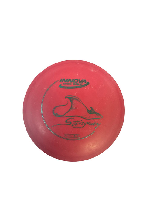 Vist Large View of Product Image Which is Used Innova DX STINGRAY Disc Golf Mid Range Red 180g