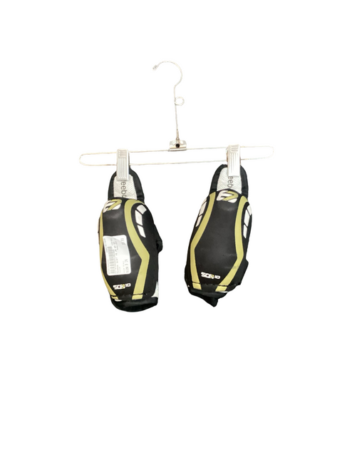 Vist Large View of Product Image Which is Used Reebok SC87 10 Junior Elbow Pads Black 9"