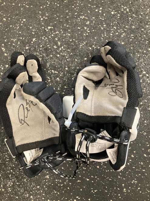 Vist Large View of Product Image Which is Used Warrior RABIL NEXT Lacrosse Gloves Junior Black XXS