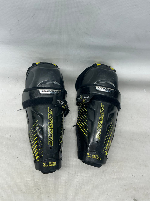 Vist Large View of Product Image Which is Used Bauer SUPREME 1S SHIN GUARDS Youth Shin Guards Black 9"