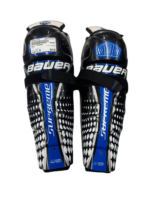 Vist Large View of Product Image Which is Used Bauer SUPREME Junior Shin Guards Black 11"